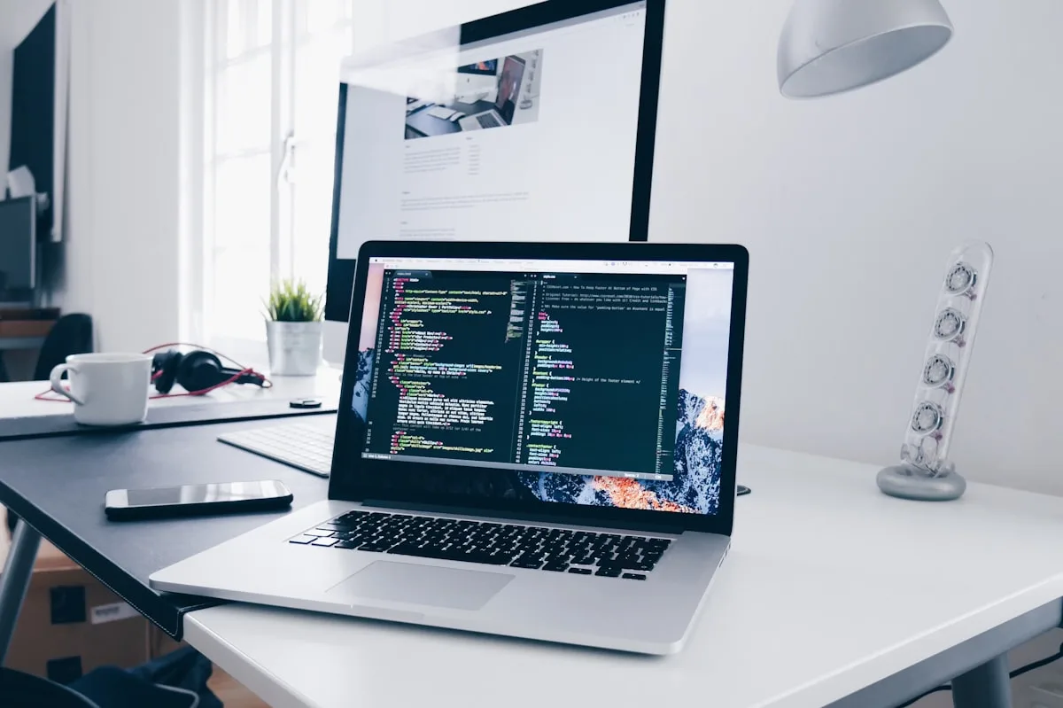 Typing on laptop - website maintenance